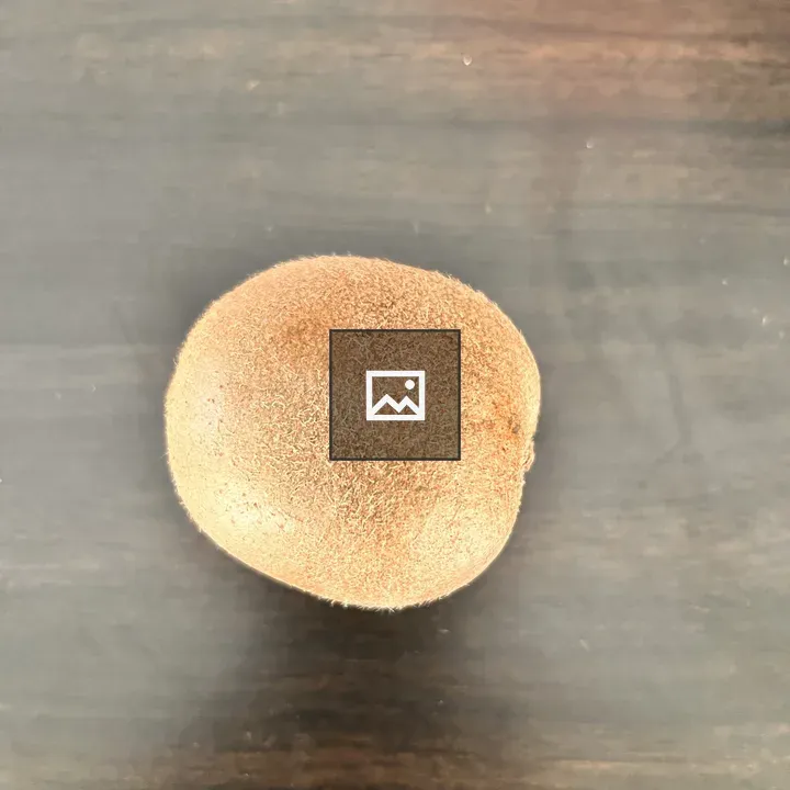 Kiwi Fruit on Wood Surface