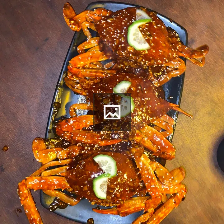 Crabs with Red Sauce on Plate