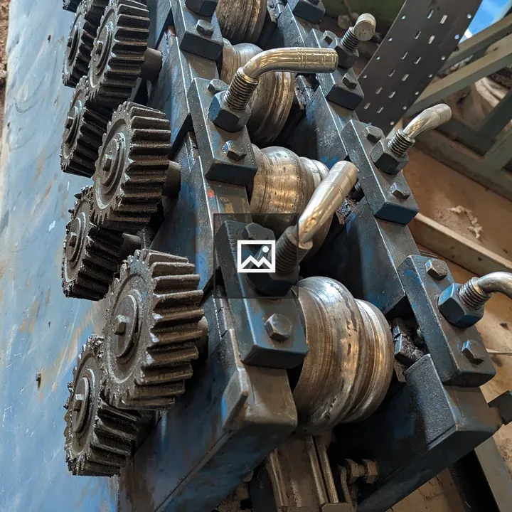 Metal cutting and rolling machine