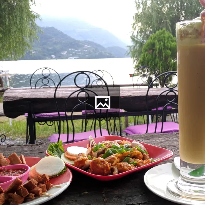MoMo, Mango Lassi and Sides on Table