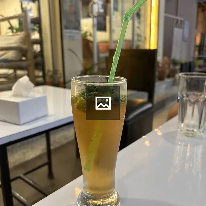 Tall Glass with Mint Garnish