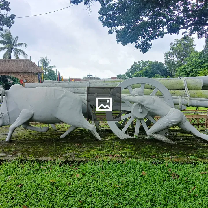 White statue farmer and cart