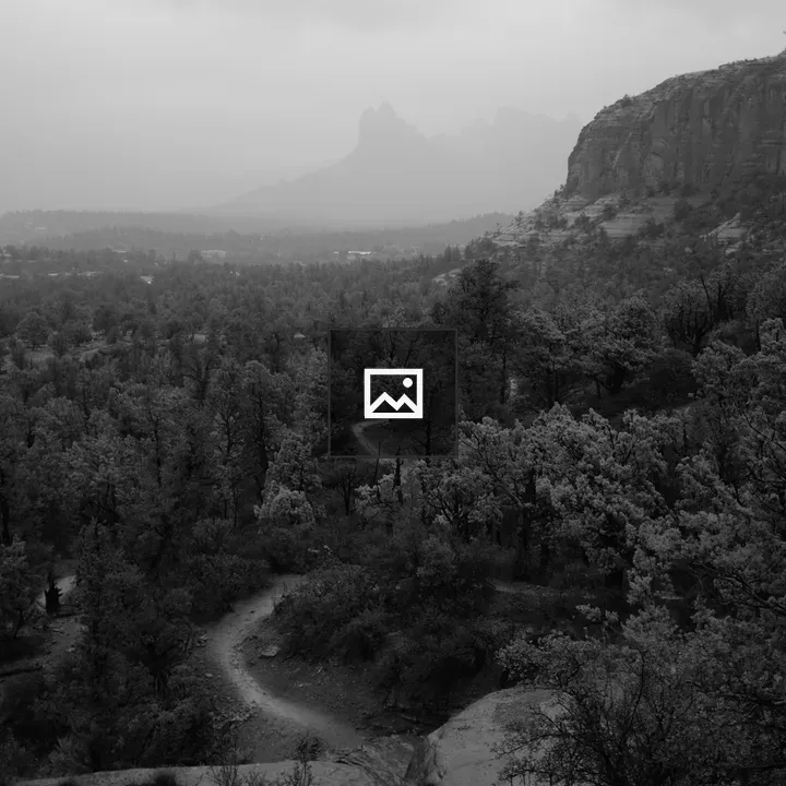 Desert Path in Fog and Rock Formations