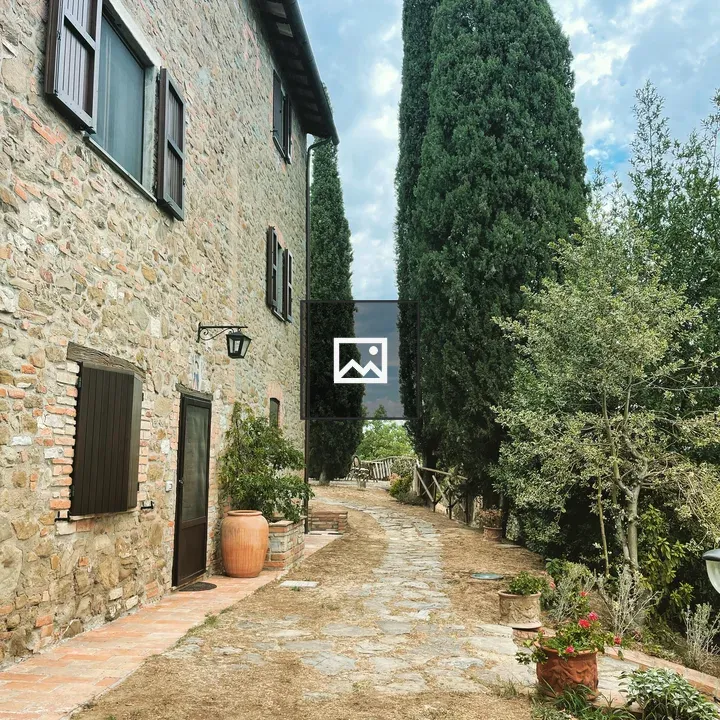 Villa façade with garden path