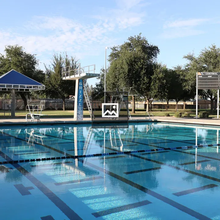 Outdoor swimming pool with lane dividers