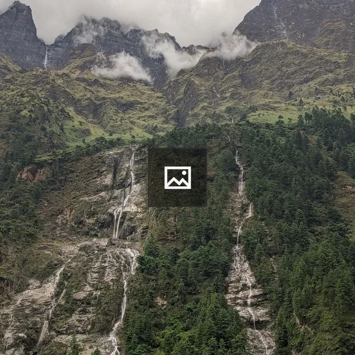Waterfall in Mountain Landscape