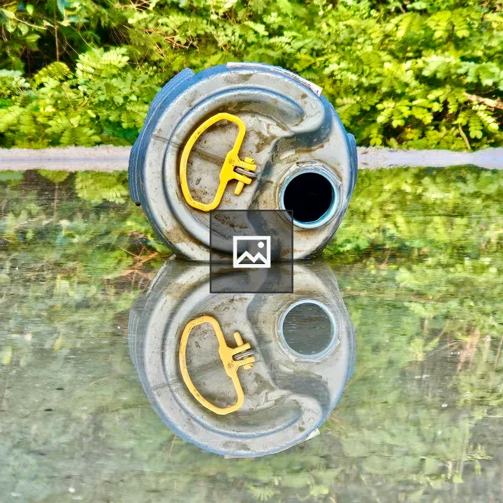 Empty chemical bottle reflection