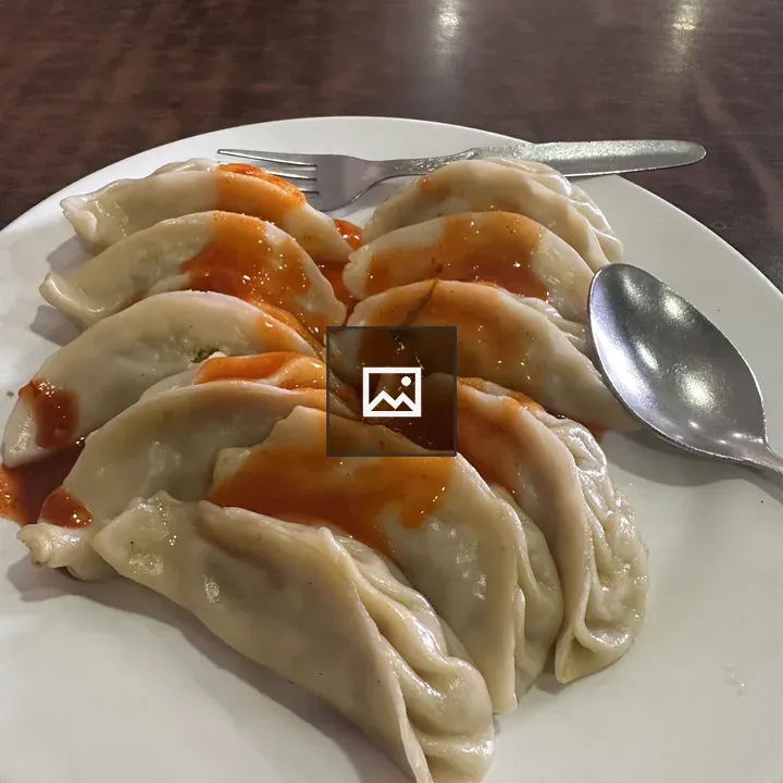 Momo Dumplings on Sauce