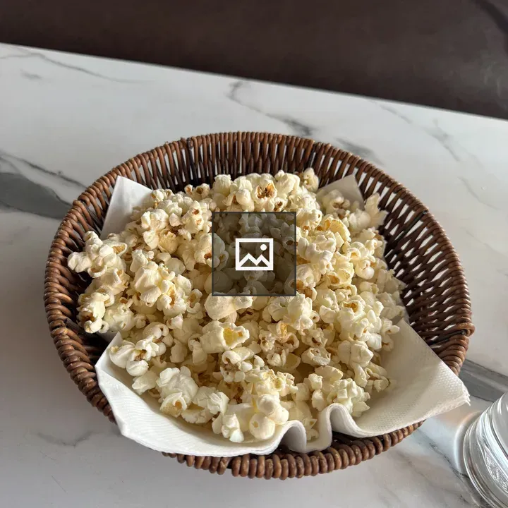 Woven basket with popcorn