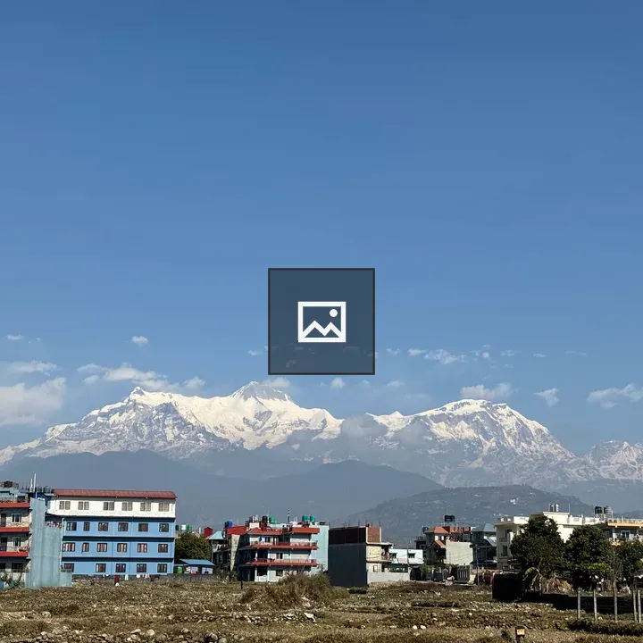 Snowy Mountains with Colorful Buildings