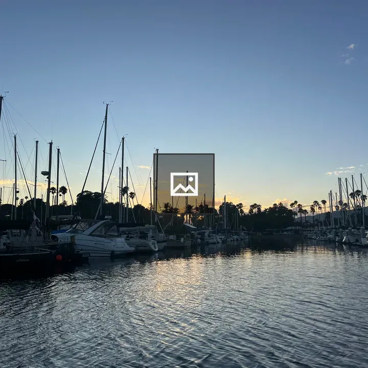 Boats at Sunset Horizon