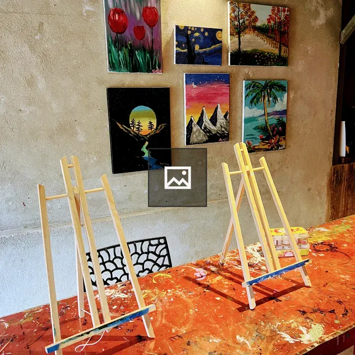 Two small wooden tabletops easels