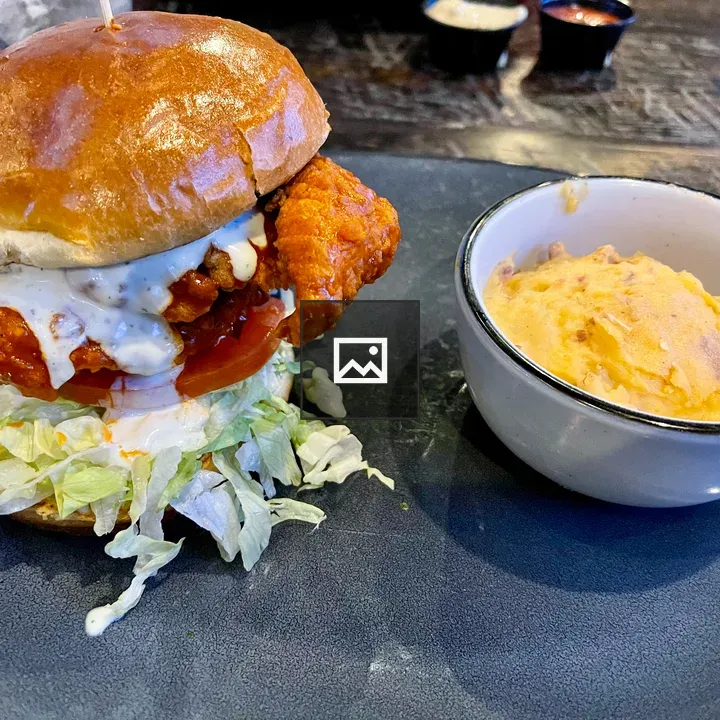 Hot chicken sandwich with cheddar mashed potatoes
