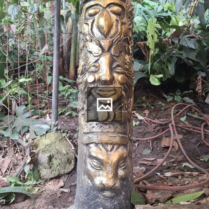 Golden and Black Totem Post