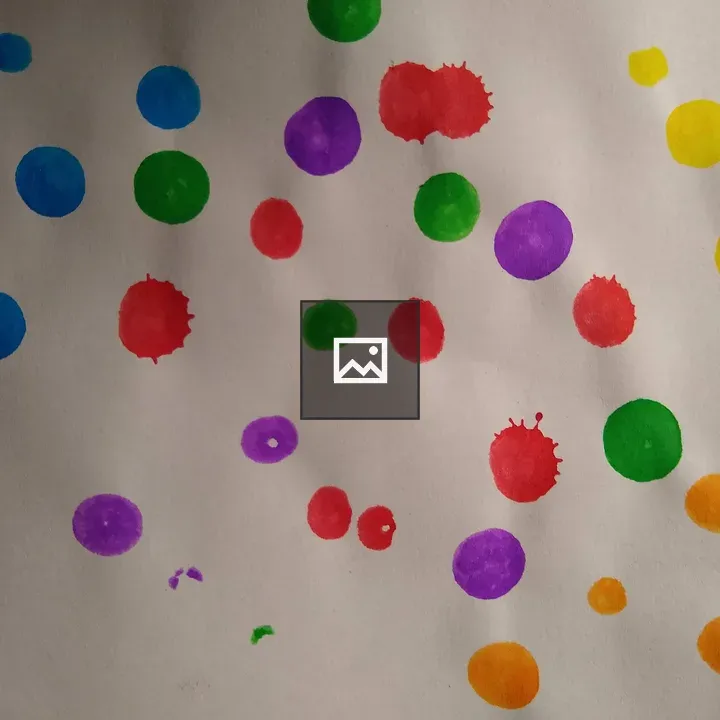 Colourful dots on paper