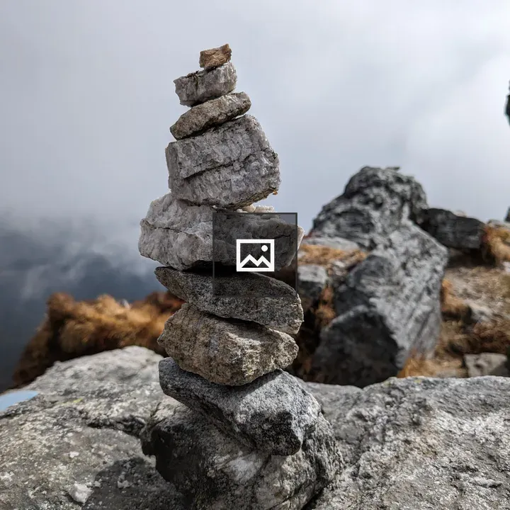 Stone pillar in nature scene