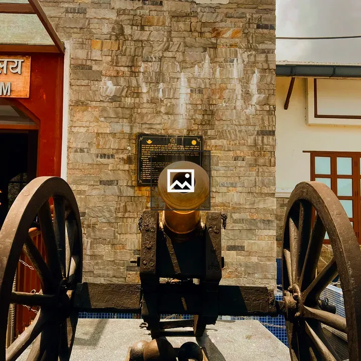 Historic black cannon with golden barrel