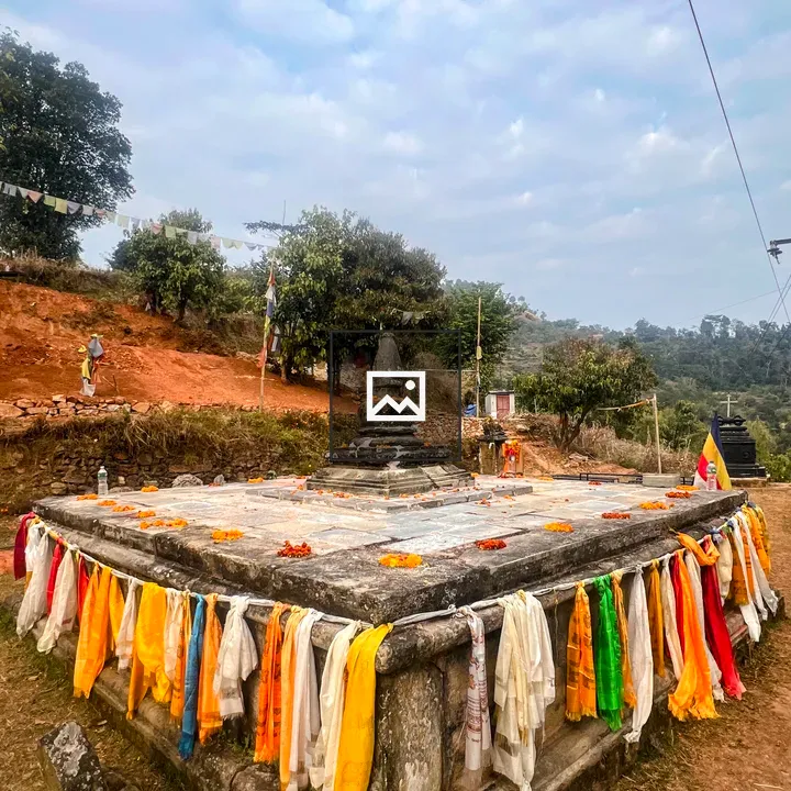 Stone Buddhist Stupa with Prayer Scarves