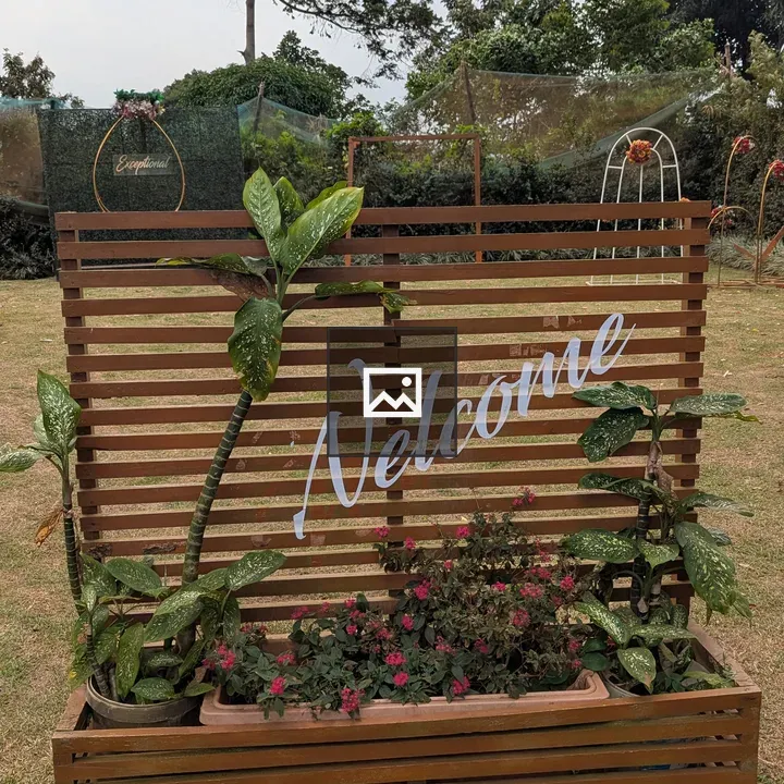 Welcome sign at garden entrance