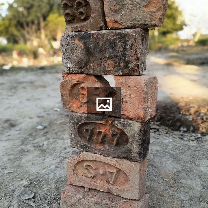 Stack of bricks with carved numbers
