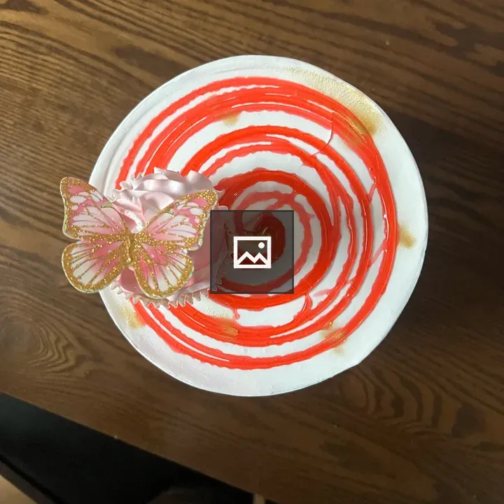 Birthday cake with butterfly ornament