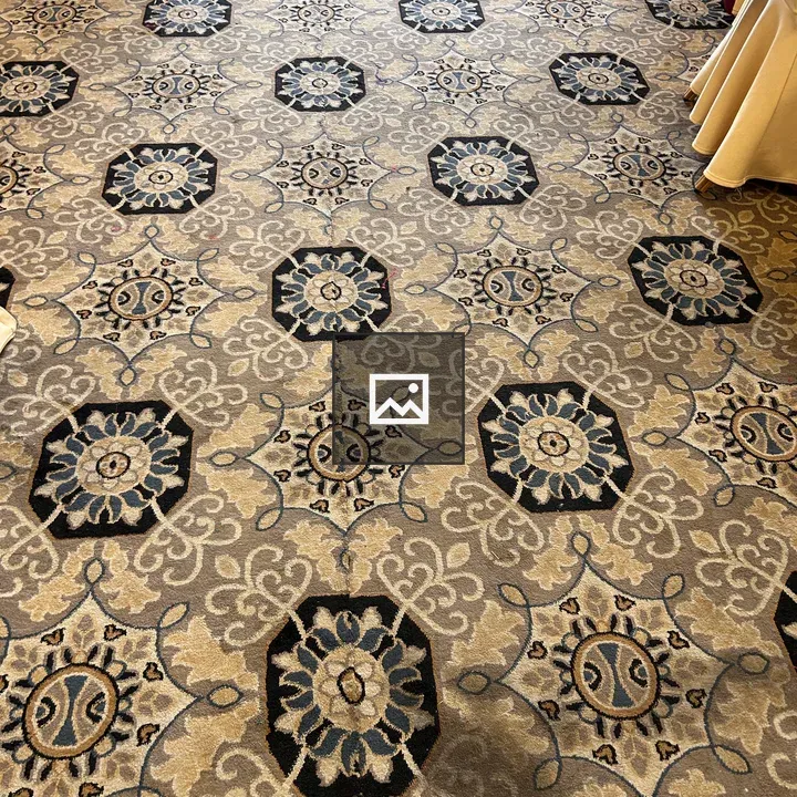 Patterned carpet with hexagons and flowers