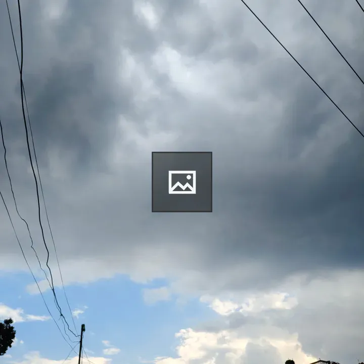Cloudy Sky Overhead with Patches of Blue
