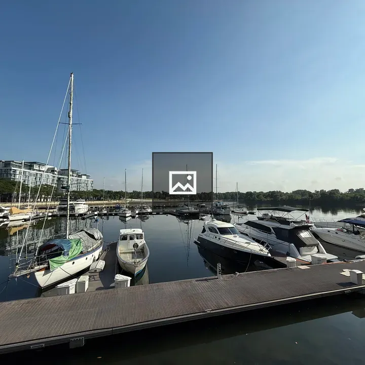 Sailboats and Dock in Bay