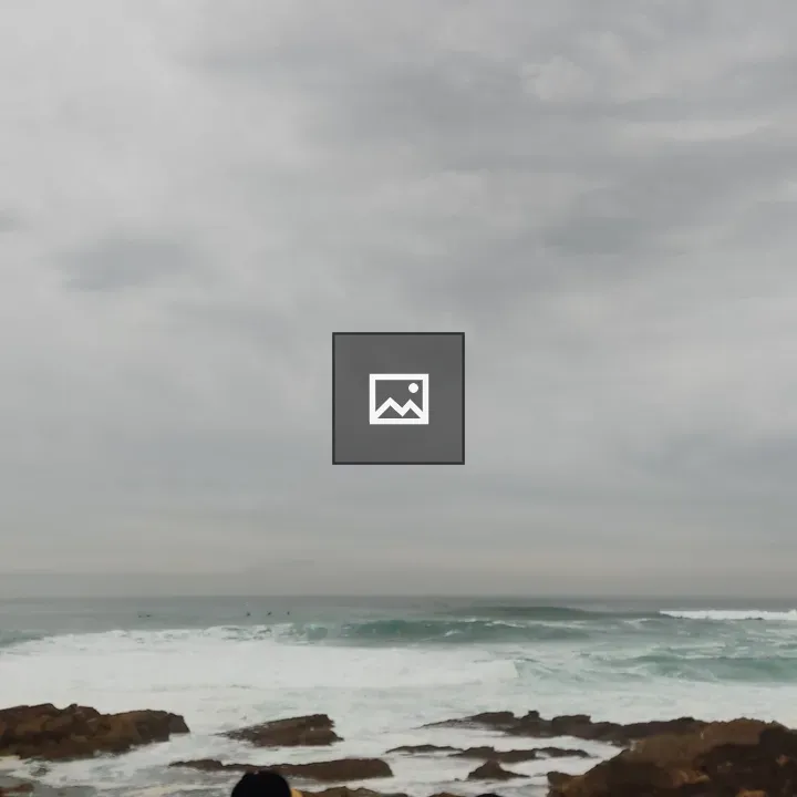 Surfers at Cantabrian Sea