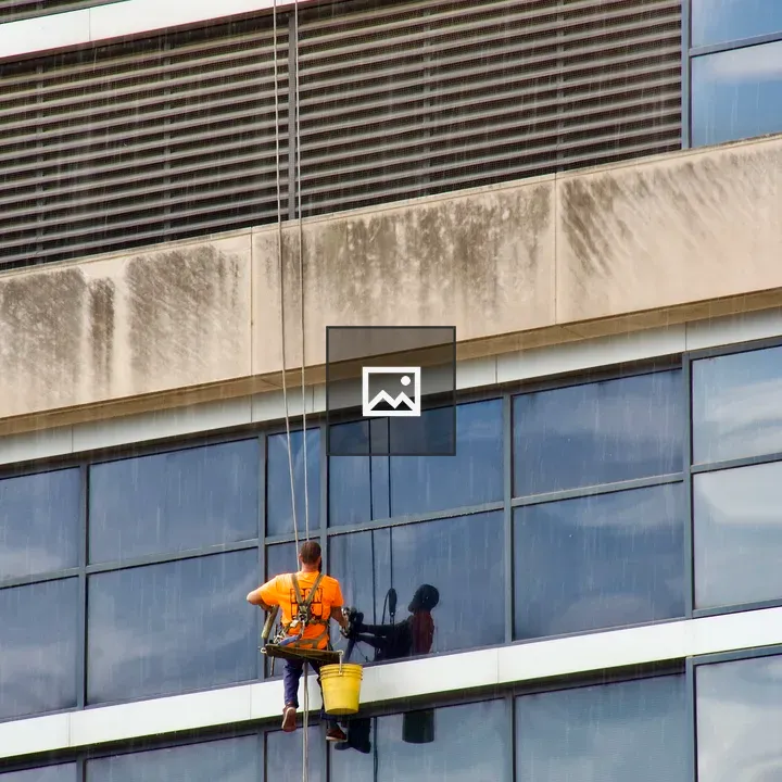 Window washer in the rain