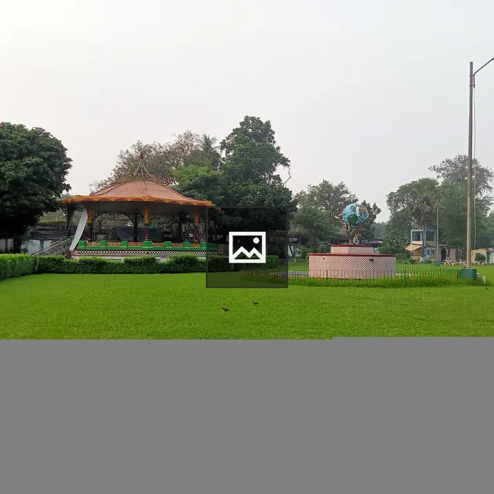 Green lawns and a hut at Eden Gardens Park