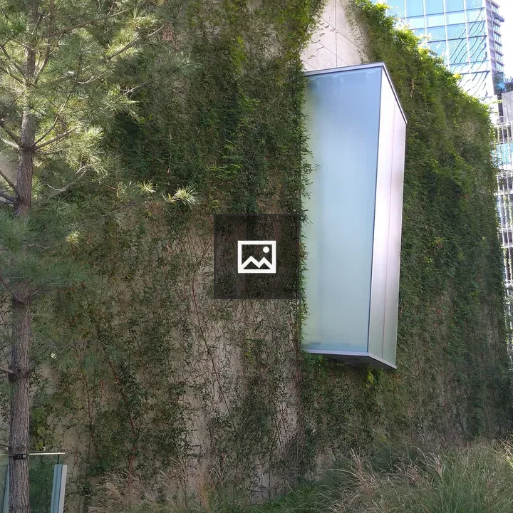 Modern Building Facade with Greenery