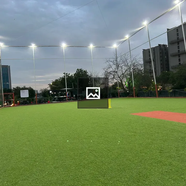 Cricket turf under stadium floodlights