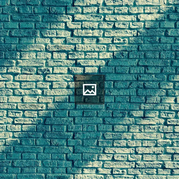 Sun rays on Barcelona brick wall