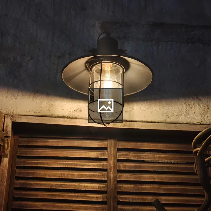 Vintage lamp above wooden window