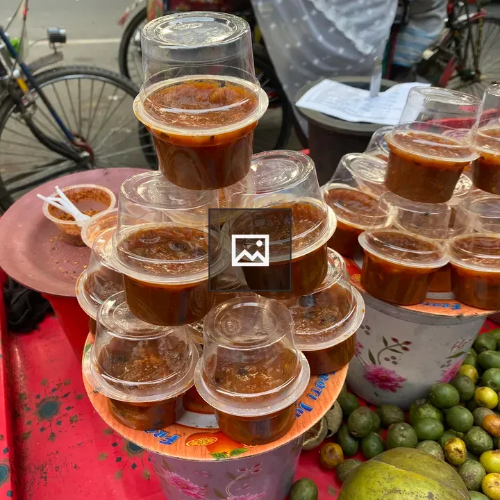 Pyramid of Dark Sauce Cups