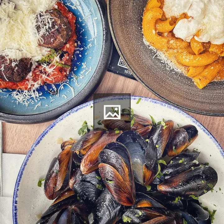 Dishes of Mussels and Meatballs