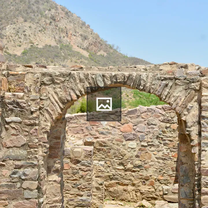 Ancient stone archway at Bhangarh Fort