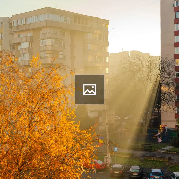 Sunrise over Cluj buildings