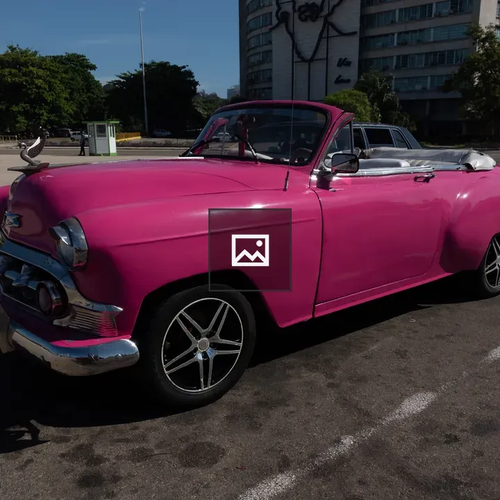 Bright pink vintage convertible