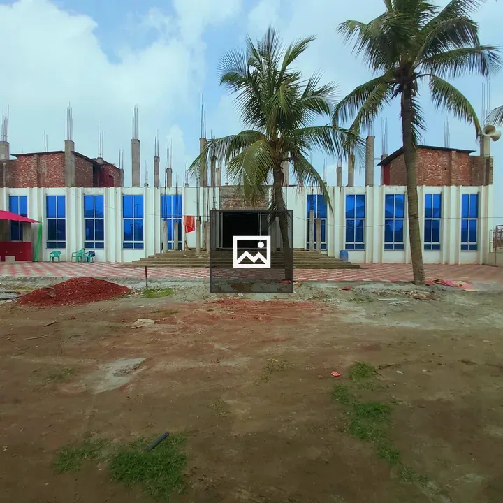 Partially Constructed Blue Glass Building