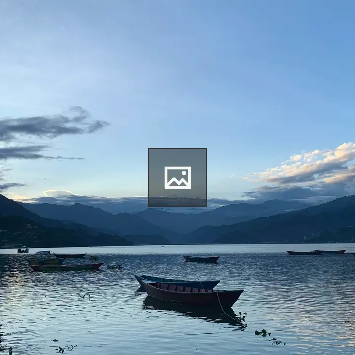 Boat In Lake At Sunset