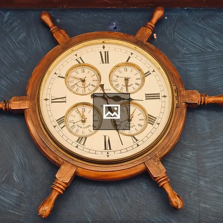 Vintage wall clock with ship’s wheel