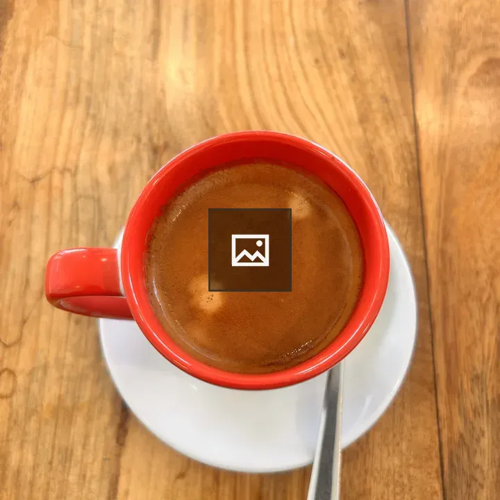 Red espresso cup on saucer