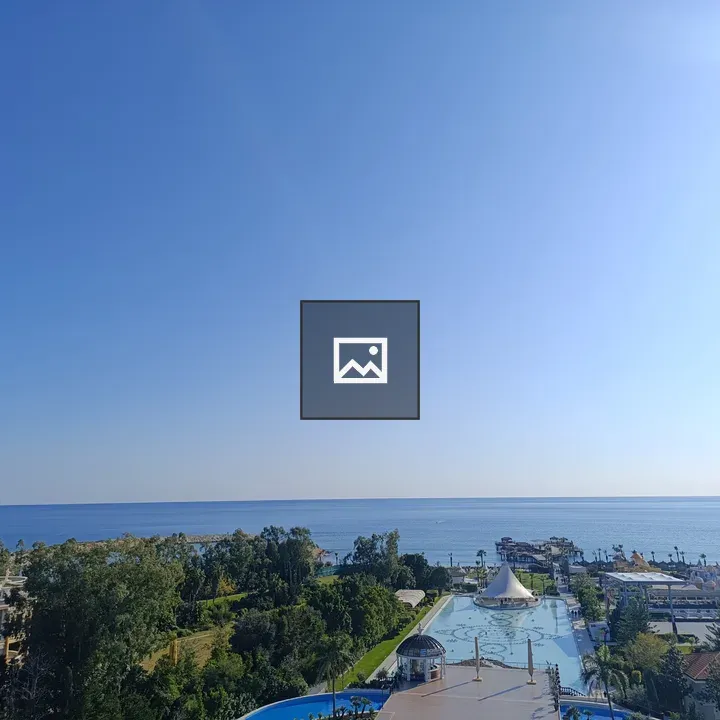 Coastal view with pool and trees