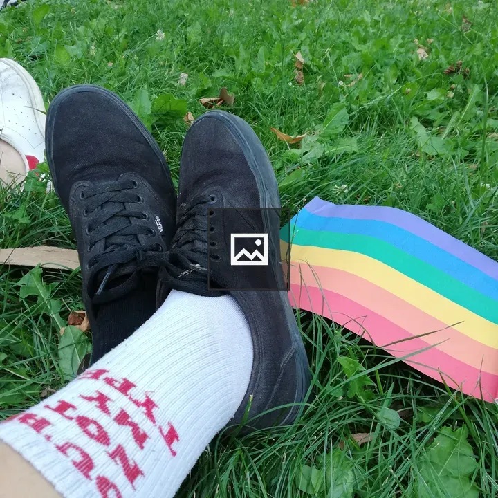 People with Rainbow Pride Flag