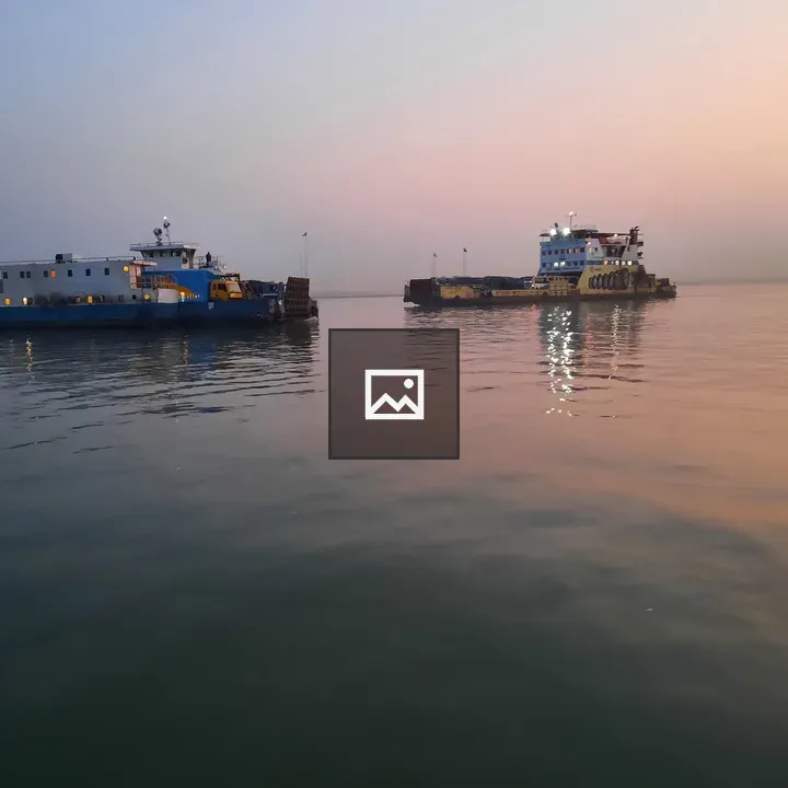 Two ferries crossing Padma River