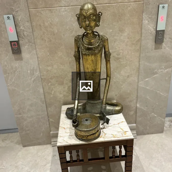 Bronze Seated Figure Sculpture