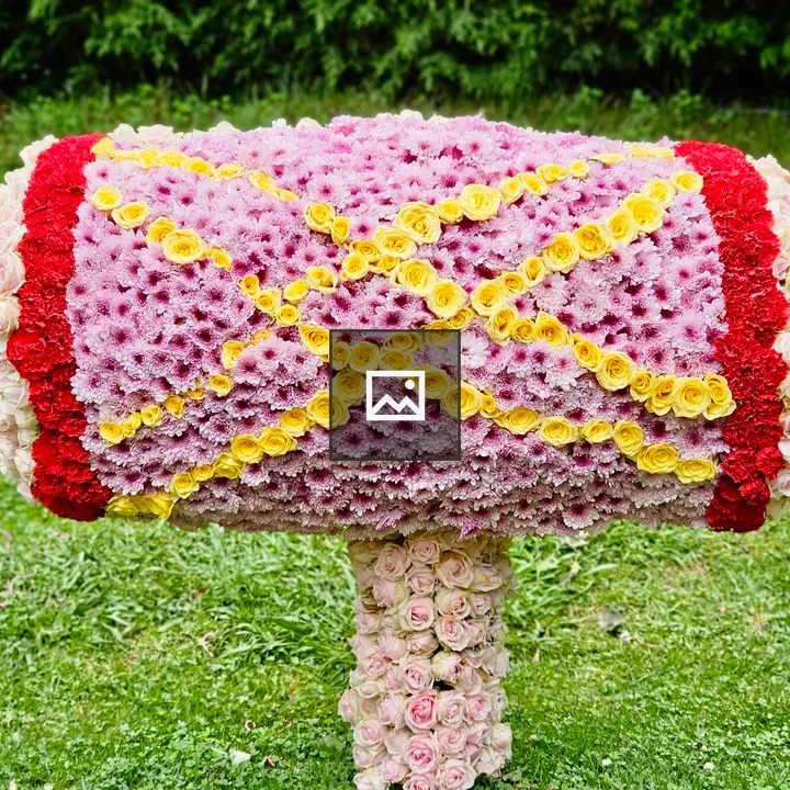 Mridangam-shaped floral sculpture