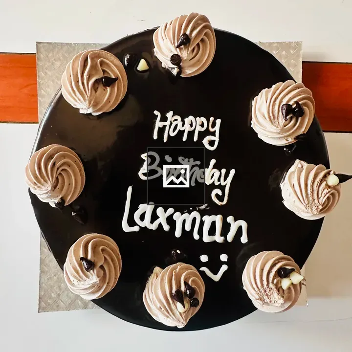 Birthday cake with chocolate topping
